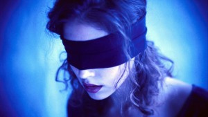 Woman Blindfolded --- Image by Â© Steve Prezant/CORBIS